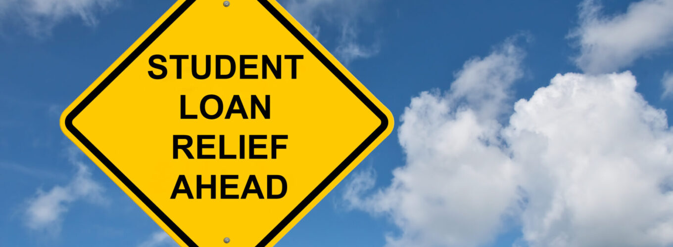 Student Loan Relief Ahead Caution Sign - Blue Sky Background