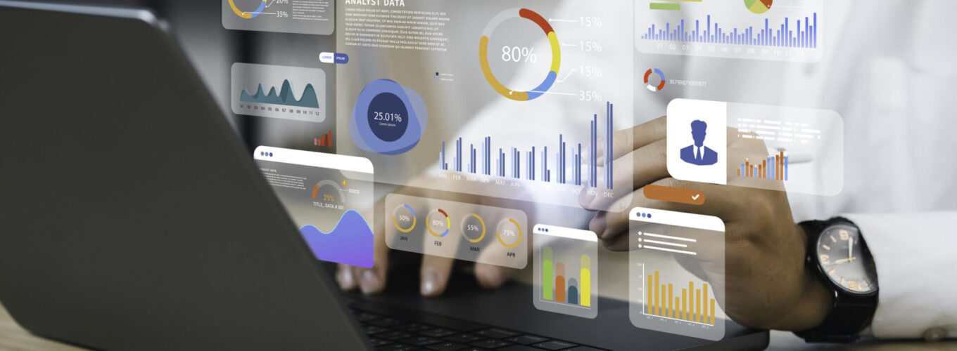 An analyst uses a computer and dashboard for data business analysis and Data Management System with KPI and metrics connected to the database for technology finance, operations, sales, marketing