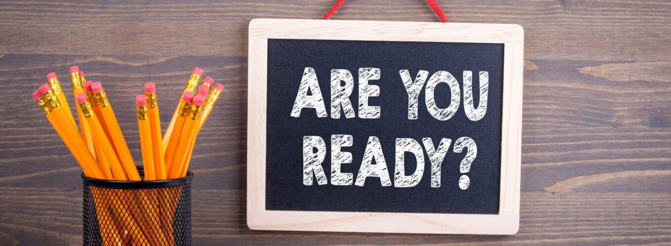 Are You Ready. Chalkboard on a wooden background