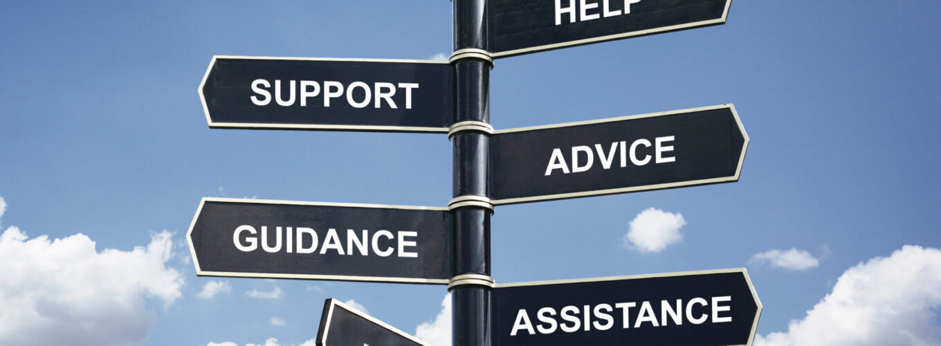 Help, support, advice, guidance, assistance and info crossroad signpost