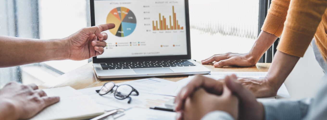 Business team collaboration discussing working analyzing with financial data and marketing growth report graph in team, presentation and brainstorming to strategy planning making profit of company.