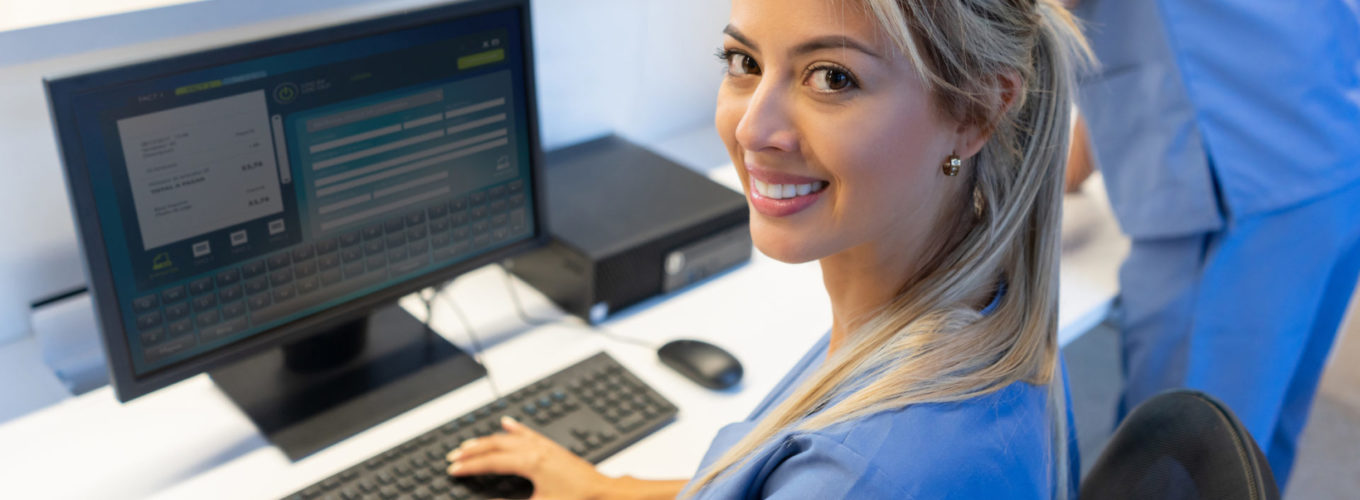 woman typing at computer